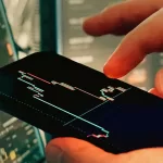 A phone showing the performance of portfolio management service